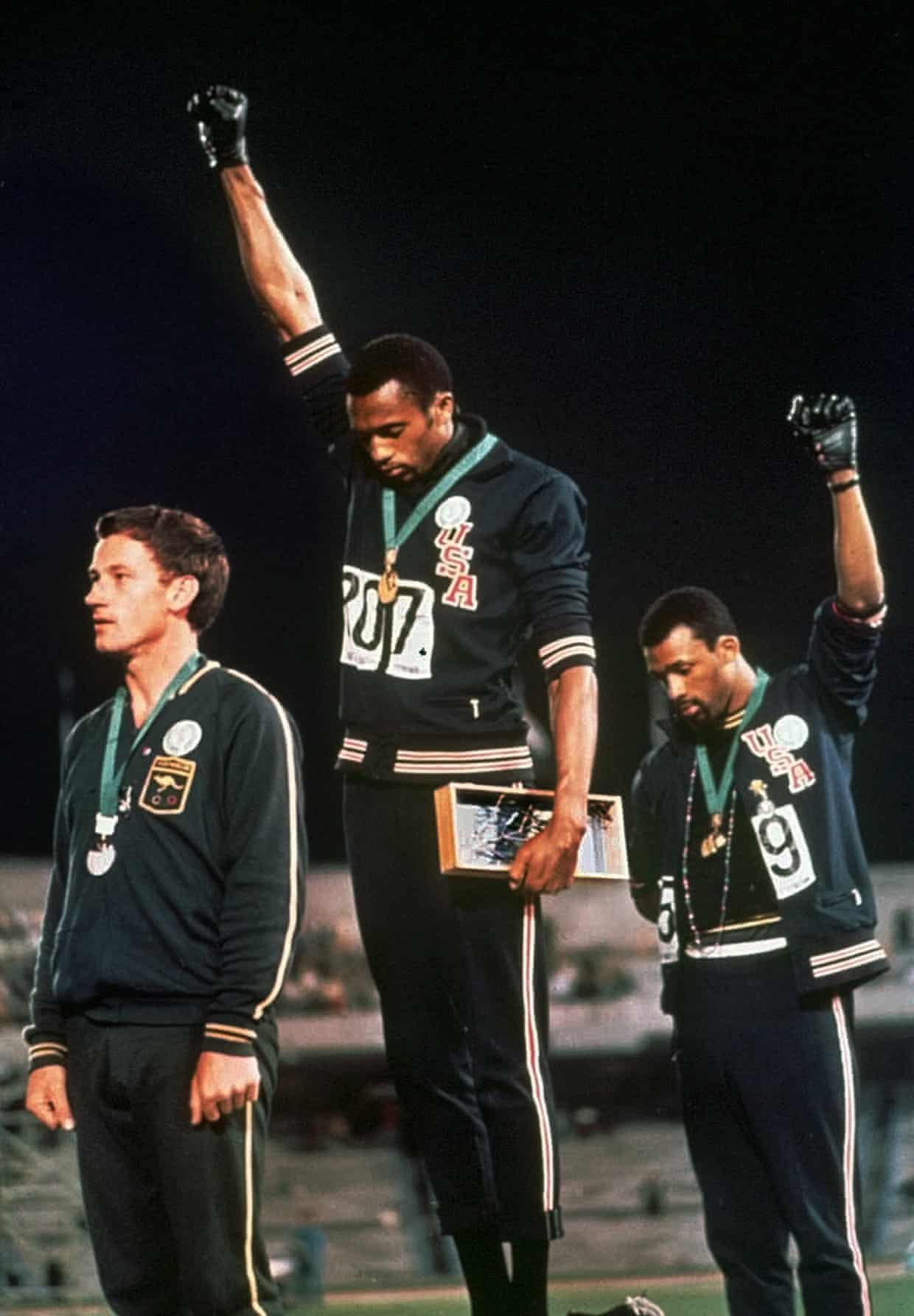 Mexico City, Mexico · 1968 — Athletes raise their fists